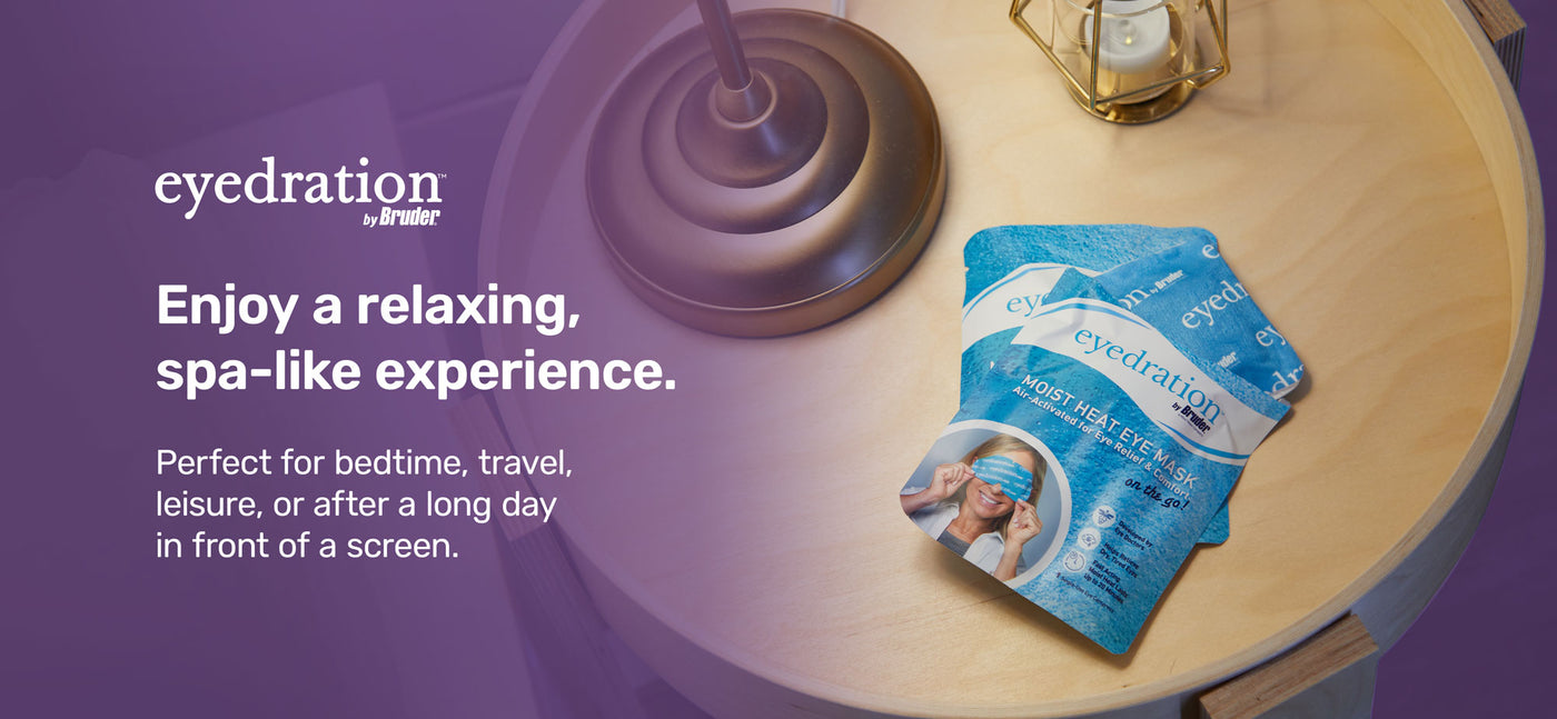 A round wooden table holds two blue packets labeled eyedration by Bruder, alongside a lit candle and decor. Text on a purple overlay reads: Enjoy a relaxing, spa-like experience. Perfect for bedtime, travel, leisure, or after a long day in front of a screen.