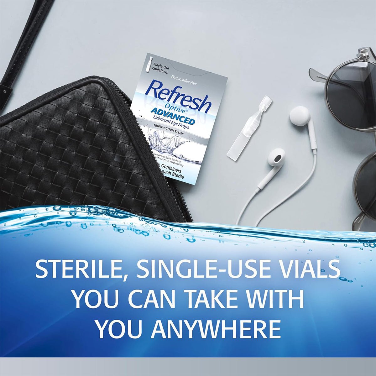 A chic black handbag on a table with sunglasses and earbuds displays Abbvies Refresh Optive® Advanced Preservative-Free Lubricant Eye Drops (30 Single-Use Vials). The text reads, “Sterile vials offering triple-action relief for on-the-go use.”.