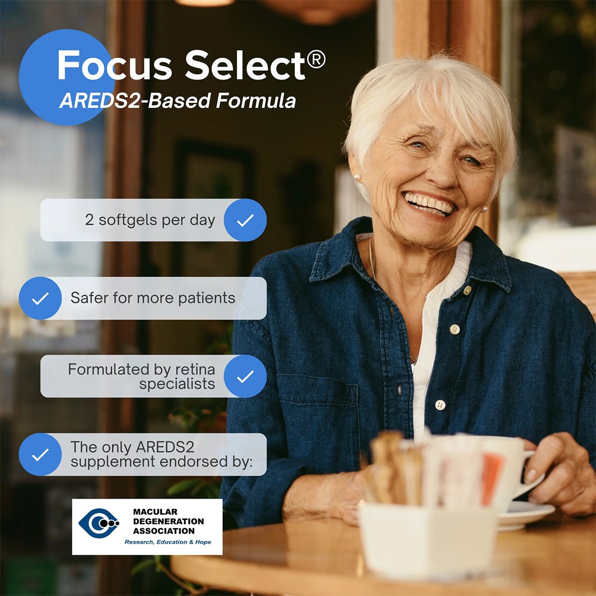 An elderly woman smiles with a coffee cup at a table, enjoying the benefits of Focus Select Supplement by Focus Vitamins. This AREDS2-based formula supports macular health with just 2 softgels daily and is endorsed by the Macular Degeneration Association for its expert formulation and safety.