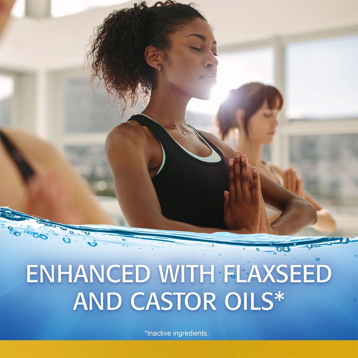 In a peaceful studio, a woman practices yoga with hands in prayer while another lingers. Text at the bottom reads, Abbvie Refresh Optive MEGA-3: Preservative-free with Flaxseed & Castor Oils for dry eye care, promoting relief with its inactive ingredients.