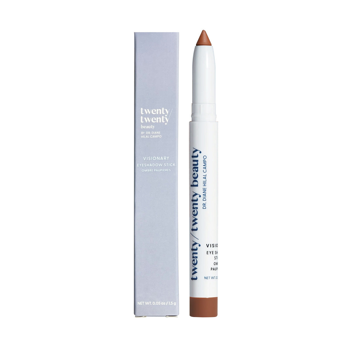A light purple Twenty Twenty box sits next to the Visionary Eyeshadow Stick, which has a white body and brown tip. The ophthalmologist-tested stick, featuring Dr. Diane Hilal-Campos care, adds elegance to your eyes without flakes.