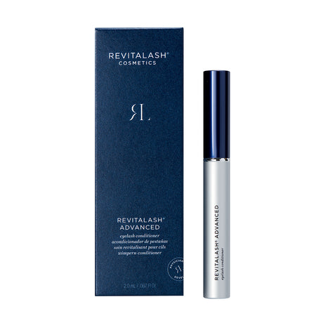 A box of RevitaLash with a sleek, silver tube capped in dark blue stands next to the RevitaLash Advanced Eyelash Conditioner and Enhancing Serum. Both packaging highlight the products effective lash-enhancing benefits.