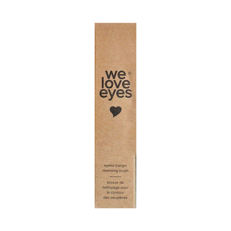 Brown rectangular box labeled with We Love Eyes and a heart icon. Below, it says Eyelid Margin Cleansing Brush in English and French. The eco-friendly design uses a tiered fiber structure to promote lash follicle health.