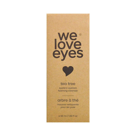 Cardboard packaging for We Love Eyes Tea Tree Eyelid & Eyelash Foaming Cleanser 25mL Mini Size includes English and French text stating it’s an eyelid cleanser. Contains a probiotic preservative system for effective eyelash cleaning.