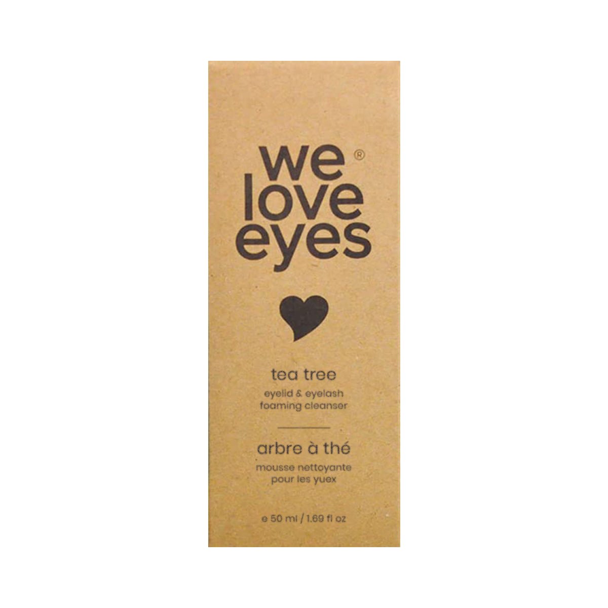 A rectangular brown cardboard package displaying the We Love Eyes logo with a heart design features English and French text for the Tea Tree Eyelid Foaming Cleanser. The 50 ml (1.69 fl oz) bottle contains a plant-based formula with tea tree oil for gentle care.