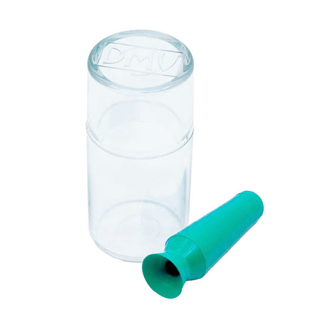 A transparent cylindrical container with DMV on the lid contains a green suction cup tool called the DMV Scleral Cup Large Contact Lens Handler, designed for easy and efficient contact lens removal with its small size and flared end.