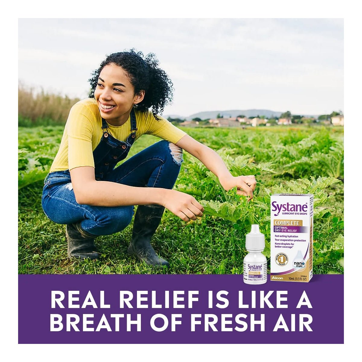 In a green field, a smiling woman with curly hair and a yellow shirt crouches beside Alcons Systane Complete Lubricant Eye Drops. Text reads, Real relief, featuring Nano-Droplet Technology, is like a breath of fresh air.