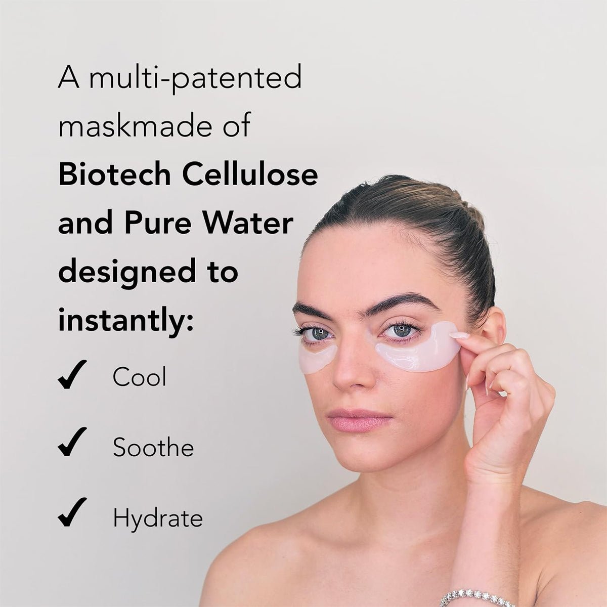 A person applies the Velez Intense Hydration Under Eye Cellulose Cooling Mask, made with biotech cellulose and pure water, for cooling, soothing, and hydration. With hair pulled back and a neutral expression, they showcase its revitalizing effects.