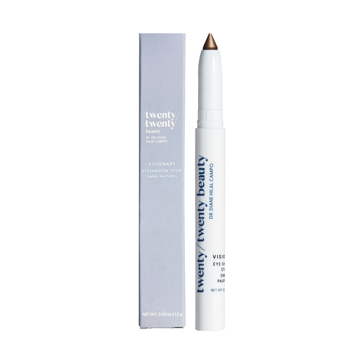 A white cosmetic pencil labeled Twenty Twenty stands upright beside its sleek, light gray box. The Visionary Eye Shadow Stick reveals a shimmery brown shade, is ophthalmologist-tested for safety, and features matching branding and text on the packaging.