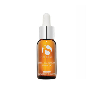 An amber glass dropper bottle with a silver cap, labeled iS Clinical Pro-Heal Serum Advance+ (15mL), sits on a white background. Featuring Innovative Skincare, it highlights Vitamin C serum benefits and antioxidant protection for sensitive skin.