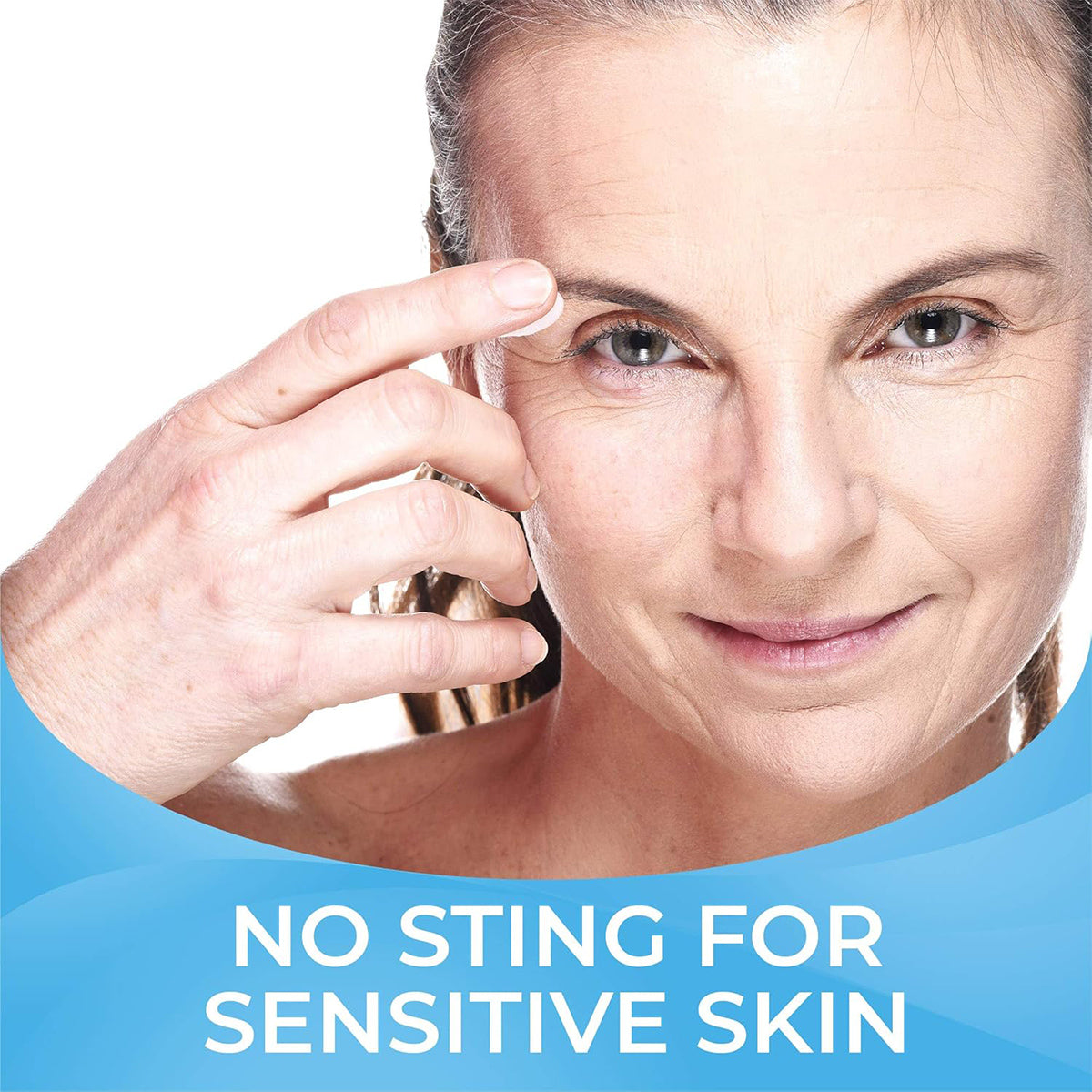 A light-skinned individual with light hair gently touches their eyebrow, promoting PRNs Cliradex® Complete Eyelid Hygiene Bundle (including towelettes & foaming cleansers) with a slight smile. The text below reads, No sting for sensitive skin, against a soothing light blue gradient background.