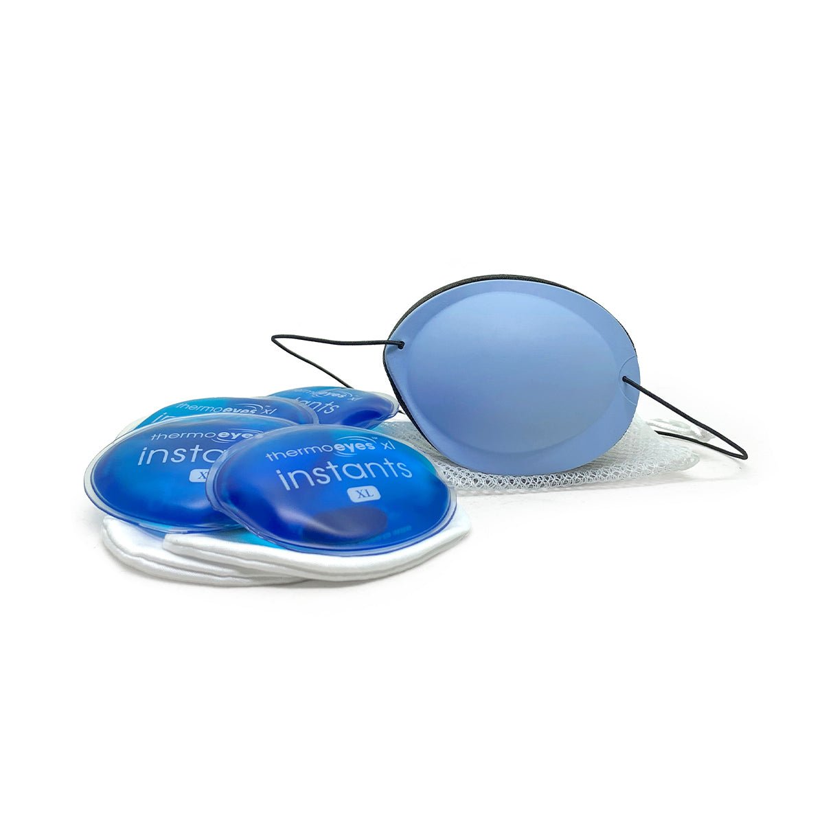 A close-up shows blue-tinted EyeEco Eyelid Stye Kit (XL - Blue) goggles from PRN, accompanied by four thermoeyes instants gel packs for hands-free styes and chalazia treatment. White mesh pads are visible below, all against a plain white background.