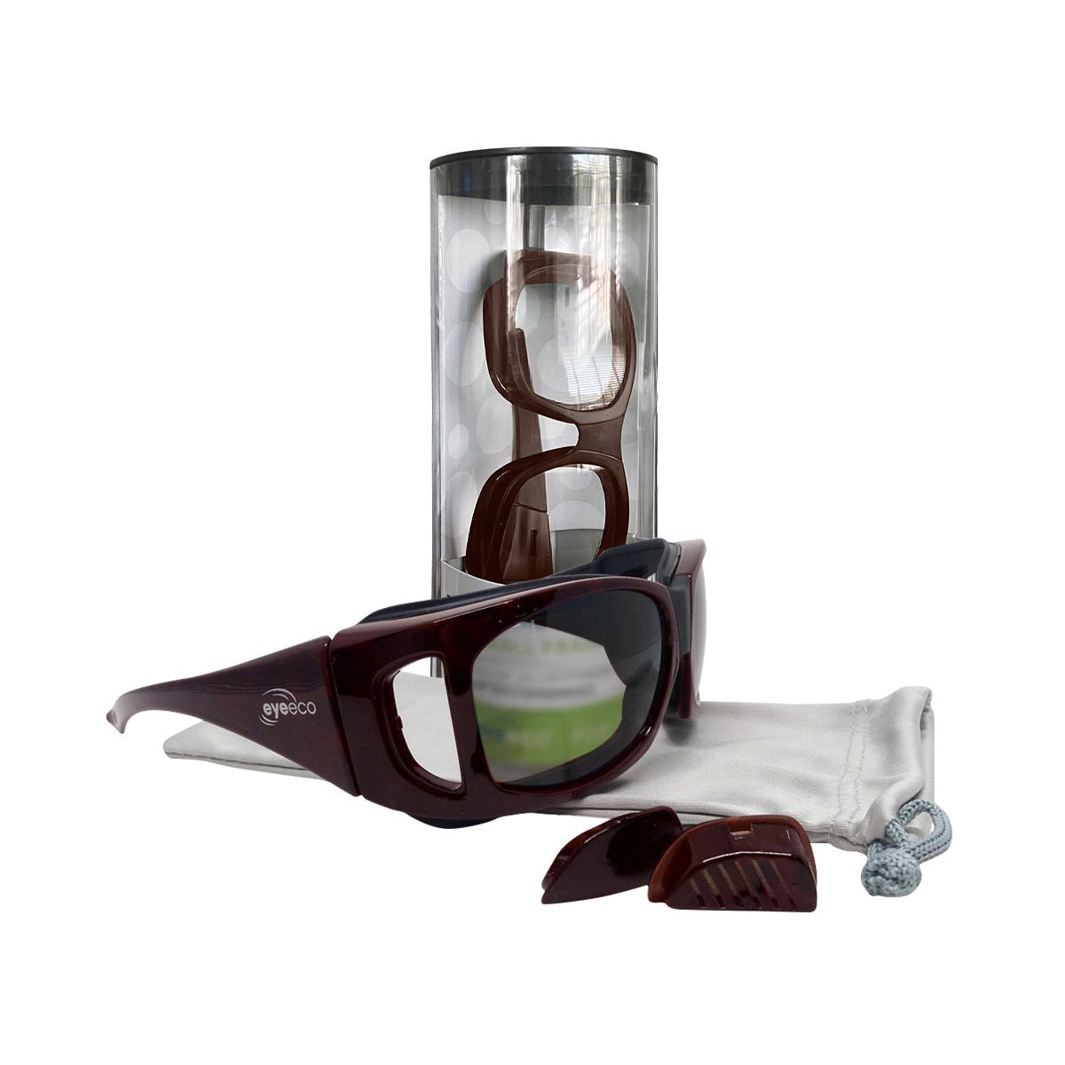 The EyeEco Large Moisture Release Eyewear by PRN in Demi Amber with a clear lens includes a microfiber bag and spare nose pads for ultimate protection. A sleek cylindrical container complements the display.