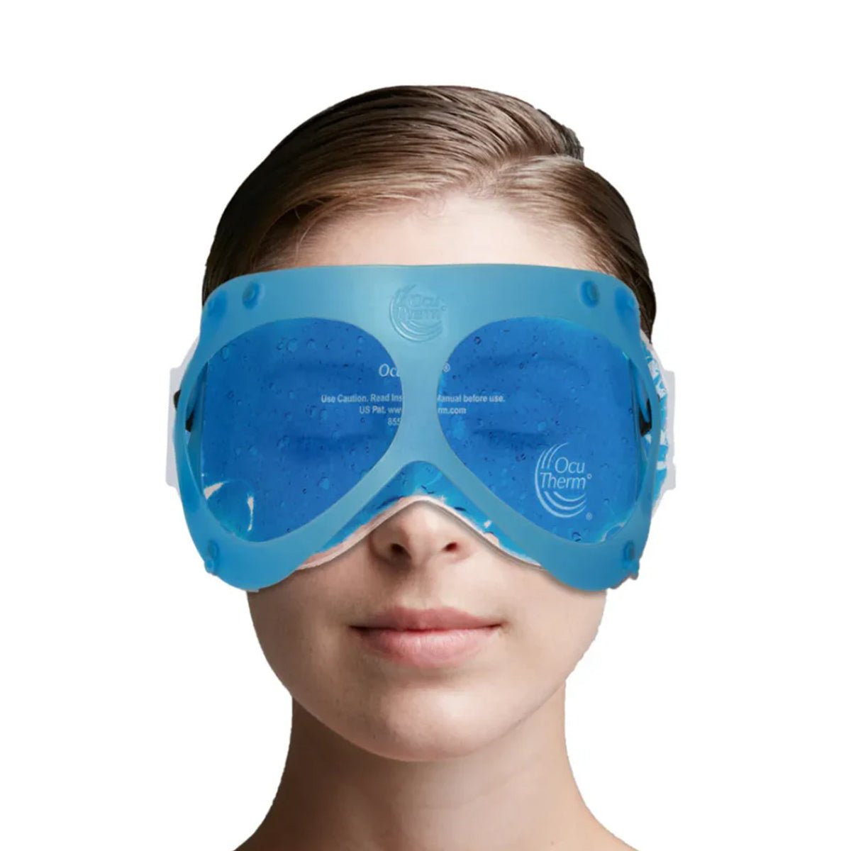 A person with hair pulled back wears an OcuTherm Heat and Cold Gel Mask Eye Relief, enjoying its therapeutic benefits against a plain white background.