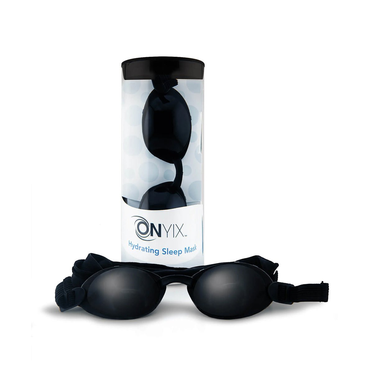 On display is the black EyeEco Onyix Hydrating Nighttime Sleep Mask by PRN, featuring adjustable straps and CPAP compatibility for dry eye relief. Its cylindrical packaging has a clear section showing the mask inside, with Onyix Hydrating Sleep Mask printed on the front.