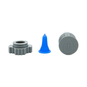 On a white backdrop, a gray gear-like object, a small blue cone, and the Nanodropper—a round gray piece with a droplet symbol—collaborate as the Nanodropper Eye Drop Extender Adaptor by Nanodropper, reducing drops by 60% for less waste and easier application.
