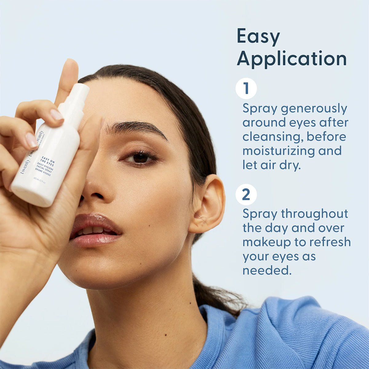 A person with long dark hair holds a spray bottle near their face, wearing a light blue top. Text beside them explains how to apply the Twenty Twenty Daily Hygiene Facial Spray (Hypochlorous Spray) around the eyes to refresh makeup and was developed by ophthalmologists.