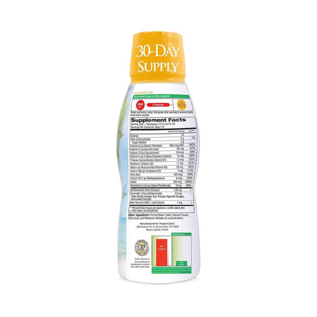 The Tropical Oasis Kids Liquid Multivitamin (16oz.) bottle offers a 30-day supply with a yellow cap, featuring supplement facts and quality seals. Ideal for kids essential vitamins, it has vibrant green and red graphics on a white background.