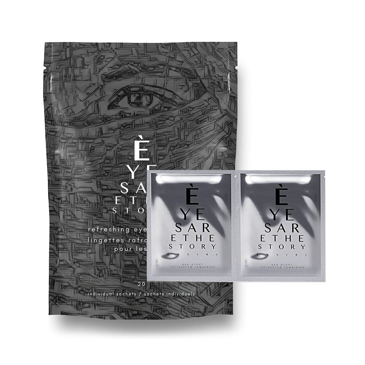 A gray, circuit-patterned pouch labeled Eyes are the Story features an eye design and refreshing eye text. Beside it, two silver packets with calendula offer soothing care as part of the 20-count Eyes are the Story Refreshing Towelettes for Eyelid Hygiene.