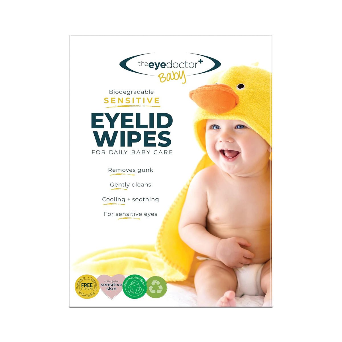 The Eye Doctor Sensitive Baby Eye Wipes packaging features a smiling baby in a yellow duck towel. It highlights benefits like removing gunk, gentle cleansing, and cooling for sensitive eyes. The wipes are preservative-free and eco-friendly symbols are displayed on the biodegradable pack of 20 wipes.