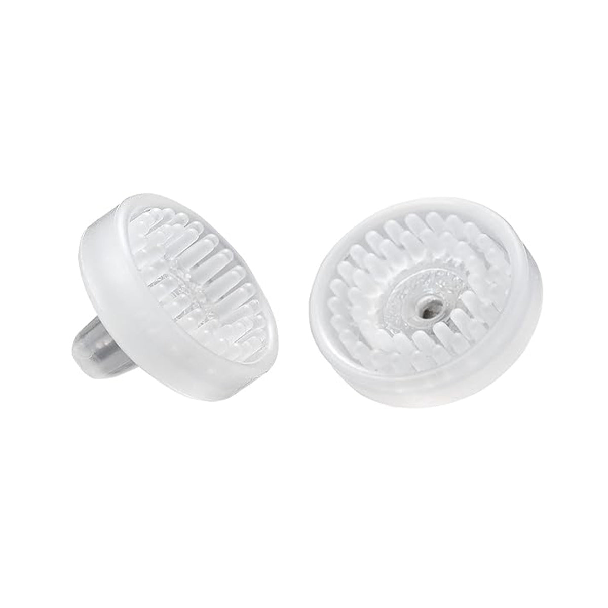 Two transparent push pins with textured, circular heads rest on a white background. One stands upright, the other lies down, echoing the precision of tools like NuSight Medicals NuLids Replacement Tips for dry eye relief.