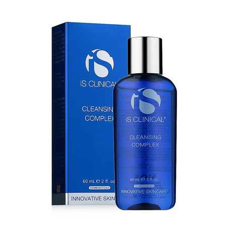 A blue 60ml bottle of iS Clinical Cleansing Complex for Resurfacing, Clearing and Deep Cleaning of Skin stands before its matching rectangular box. It features a silver cap and text detailing the products name.