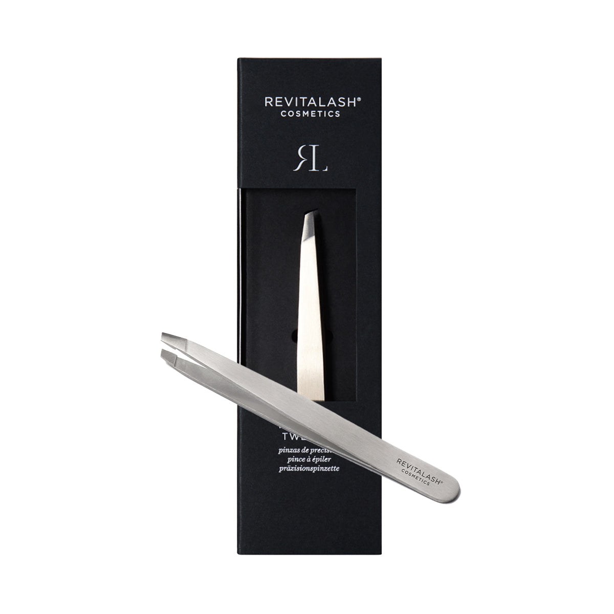 Close-up of RevitaLash Precision Tweezer, featuring stainless steel with a silver finish and slanted tip. Nestled in sleek black packaging with the elegant RevitaLash logo, perfect for crafting perfectly arched brows.