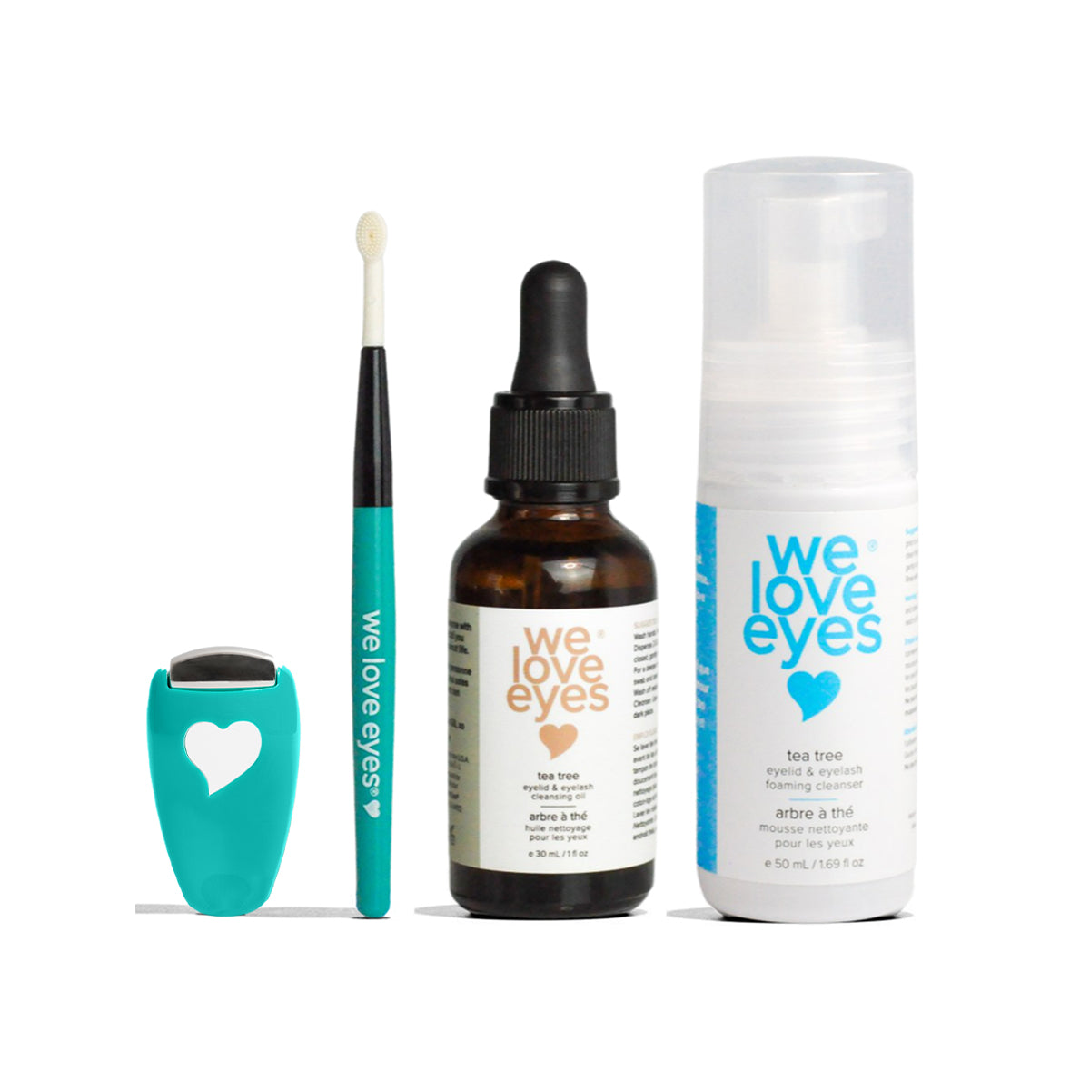 The Stye Cleaning Kit by We Love Eyes includes a turquoise eyelid massager, teal brush with white bristles, brown tea tree oil dropper bottle, and a clear cleanser with turquoise labels. All items feature the We Love Eyes heart logo. Perfect for stye treatment.