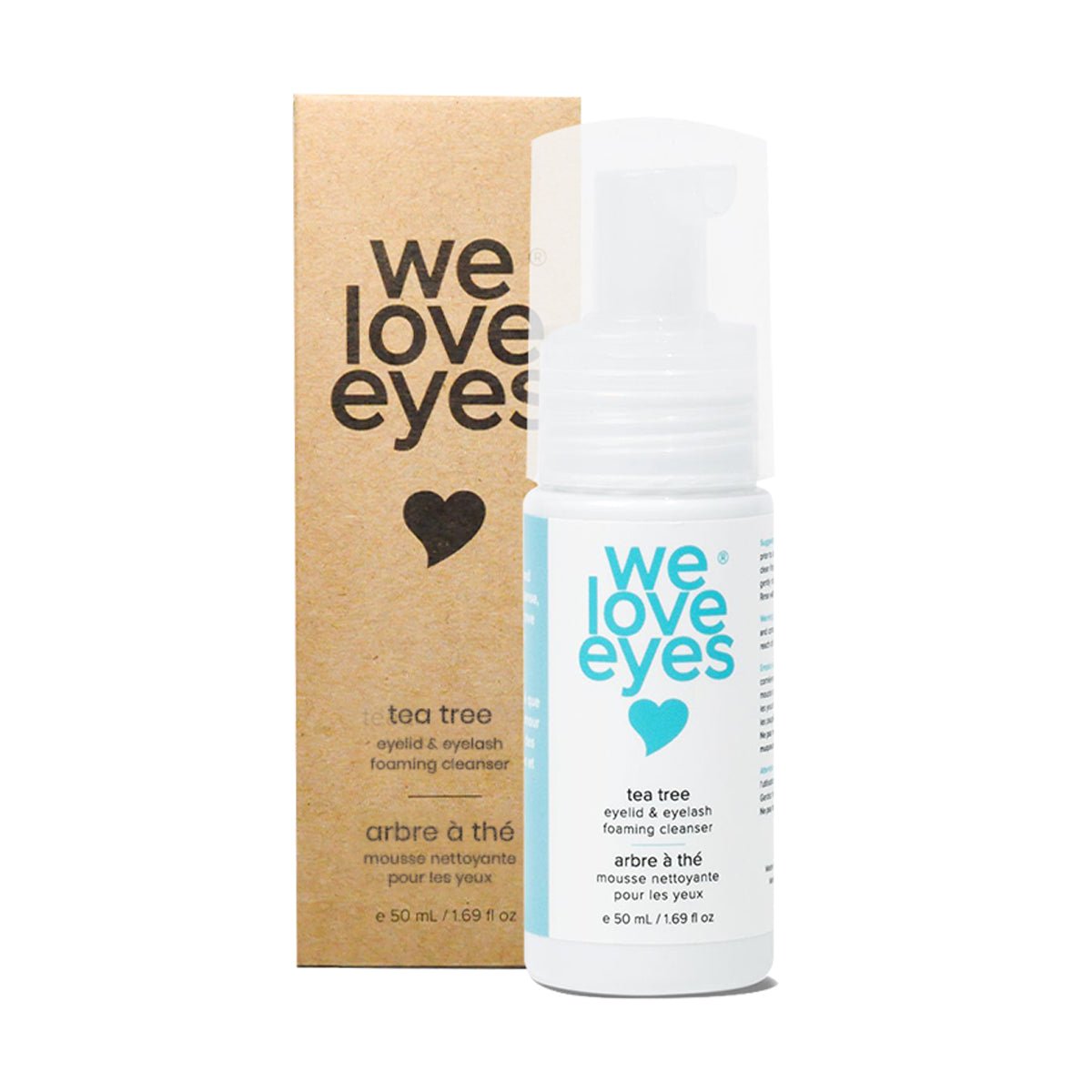 A We Love Eyes Tea Tree Eyelid & Eyelash Foaming Cleanser 25mL mini bottle with a pump dispenser is displayed in front of its craft box, both highlighting the brands logo and product details.