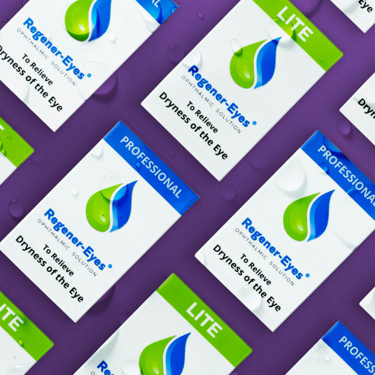 Boxes of Regener-Eyes eye drops are arranged on a purple surface. The packaging is labeled Professional and Lite versions for relieving eye dryness, featuring blue and green droplet graphics. Water droplets are scattered across the surface.
